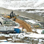 Workers prepare to pour concrete Tuesday at the George B. Flegal Dam and Reservoir